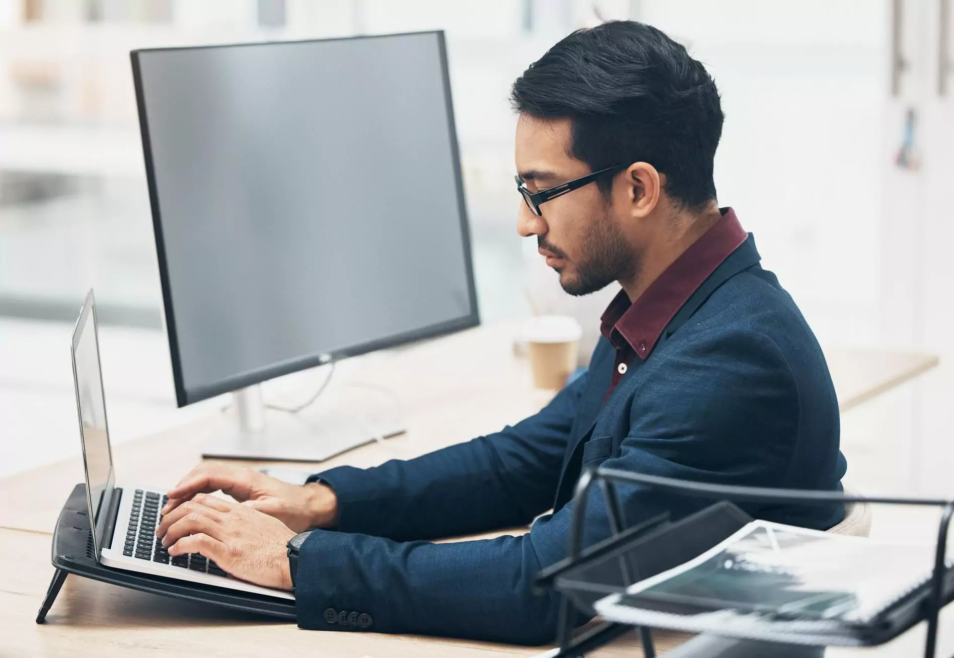 Professional working on laptop